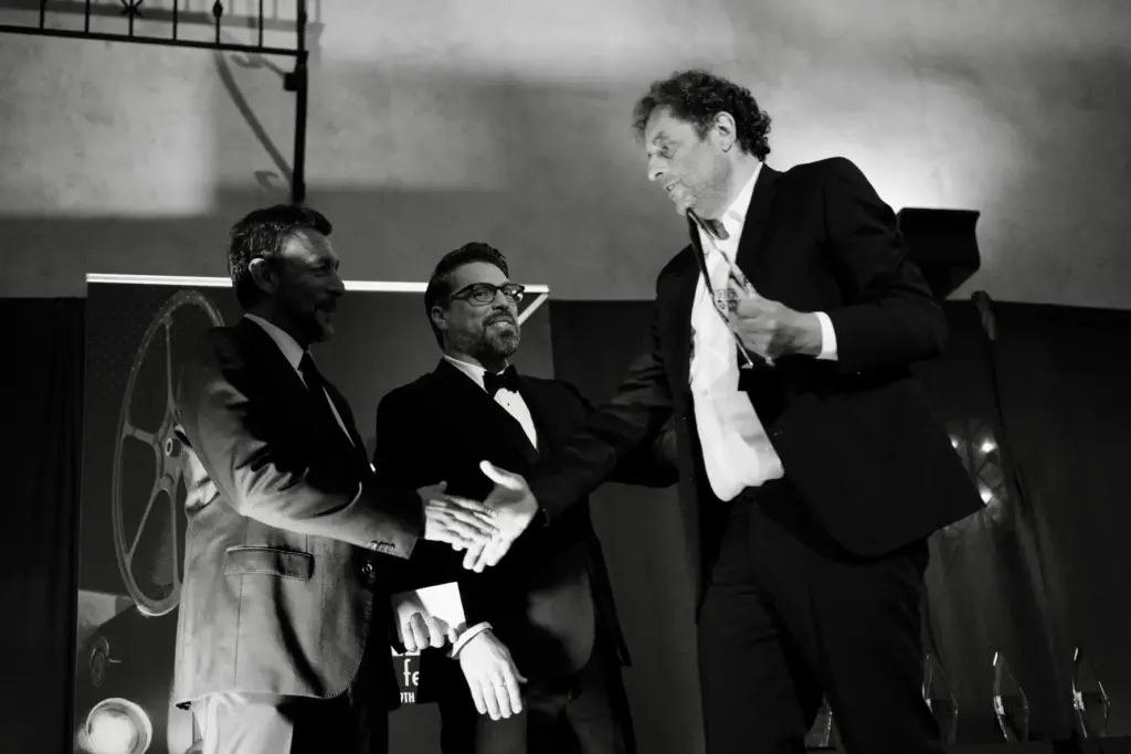 Festival Director, Nino Simone, presents the Golden Palm Award to Bulgarian director Theodore Ushev at the 23rd Annual International Beverly Hills Film Festival® / Photography by Billy Baque